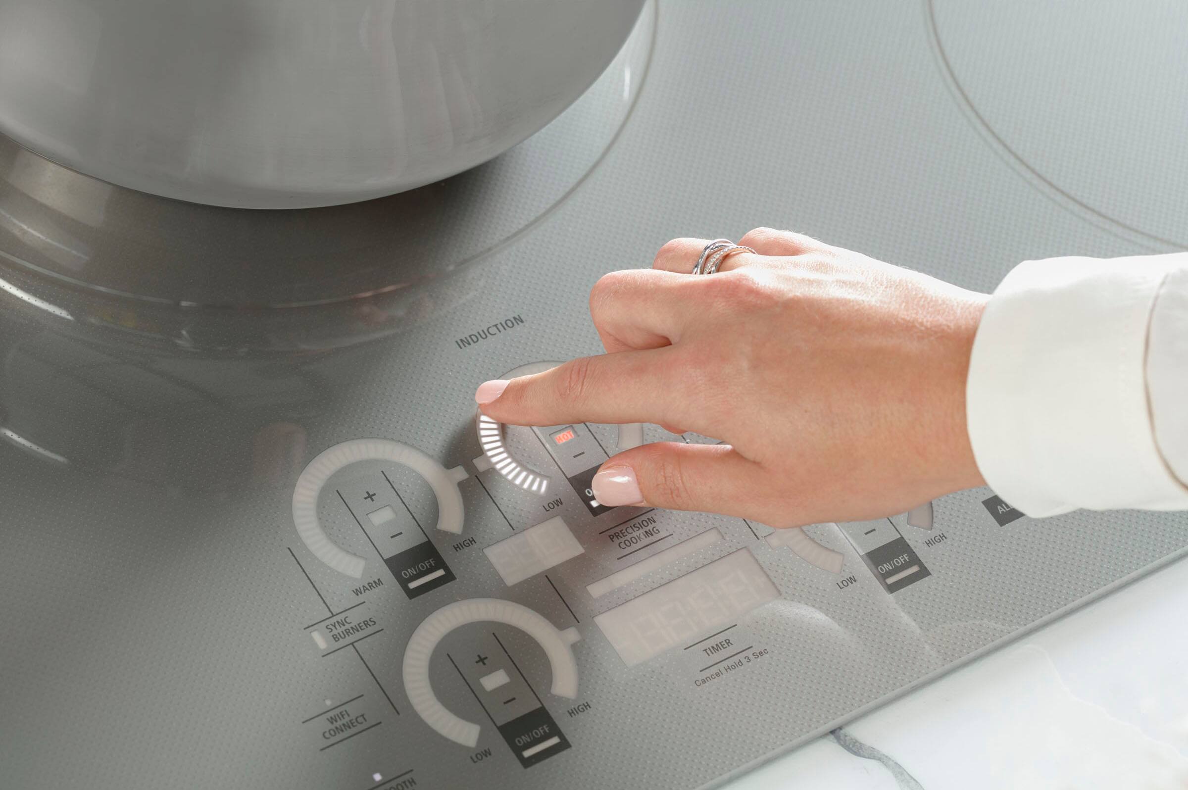 Alt View 18. Monogram - 36" Built-In Electric Cooktop - Black Graphite.