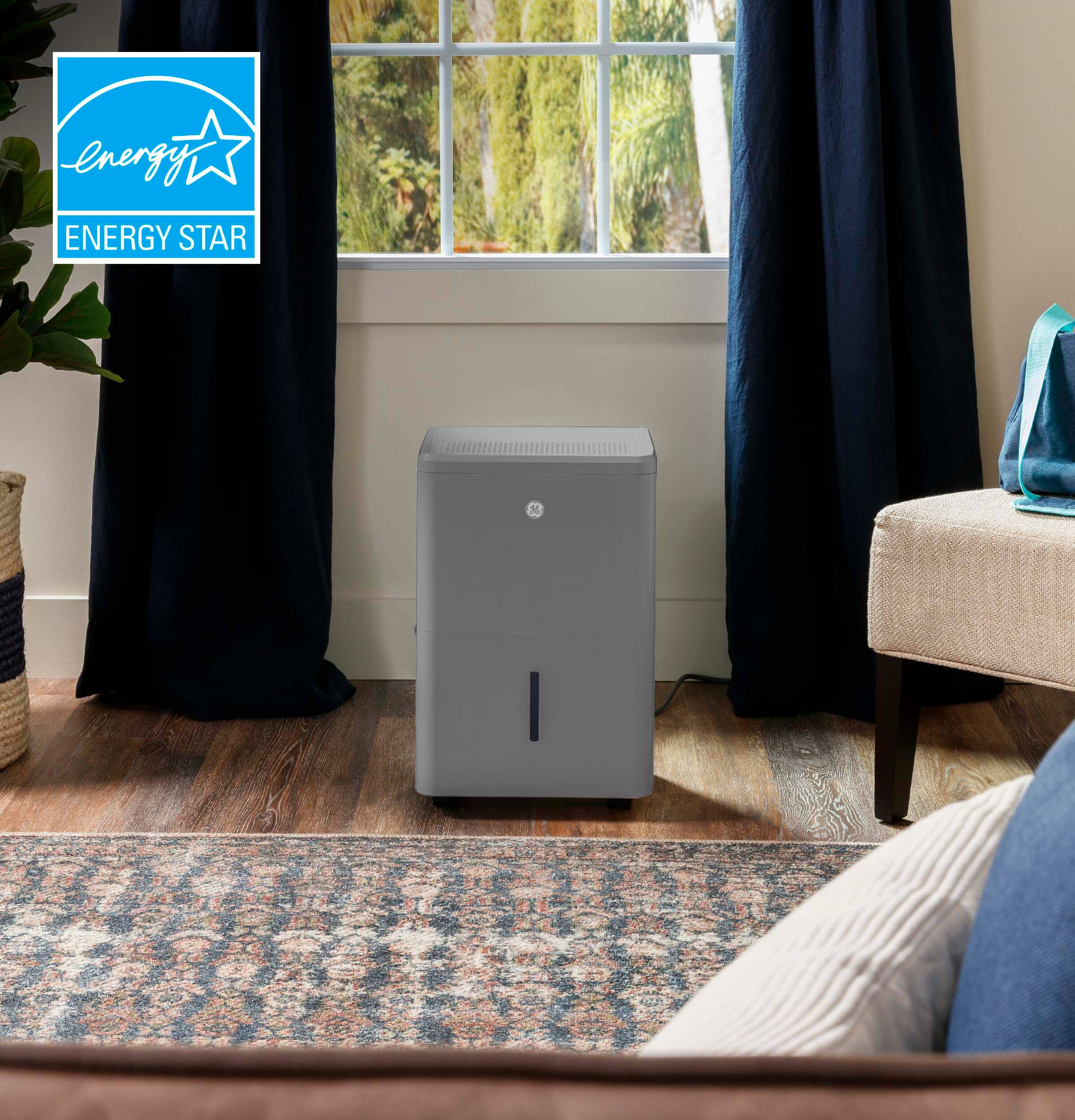 Left. GE - 50-Pint Energy Star Portable Dehumidifier with Smart Dry - Grey.