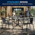 The image showcases a patio setting with a dining table surrounded by numerous chairs. The table is accompanied by potted plants, creating a pleasant and inviting atmosphere. The chairs are arranged around the table, with some chairs stacked on top of each other, indicating that they are part of a stackable design. This design allows for efficient use of space and easy storage when not in use. The stackable chairs are recommended for stacking up to 23 chairs, making them a practical and versatile option for outdoor gatherings and events.