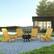 Alt View 11. Alamont Home - Charlestown Star and Moon Fire Pit with Mesh Cover & 4 Poly Resin Adirondack Chairs - Yellow.