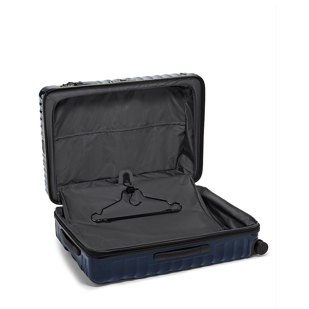 Left View: TUMI - Extended Trip 32" Expandable 4 Wheeled Spinner Suitcase - Navy