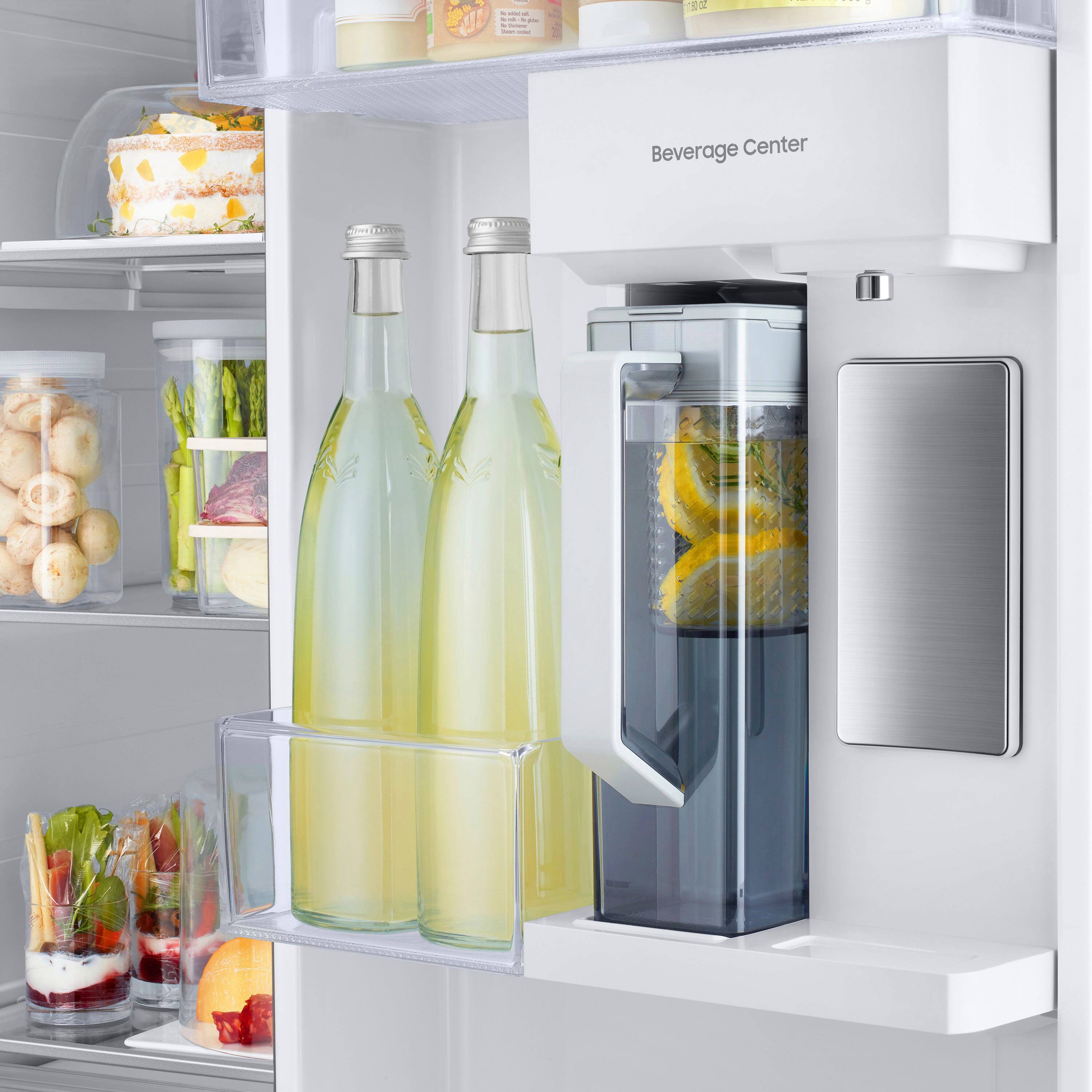 A Beverage Center is a refrigerator that is specifically designed to store and chill beverages. In the image, there is a Beverage Center with a door open, revealing a variety of bottles and a pitcher of lemonade. The refrigerator is filled with different types of drinks, including juice, water, and soda. The Beverage Center is a convenient and efficient way to keep beverages cold and easily accessible, making it a popular choice for households and offices.