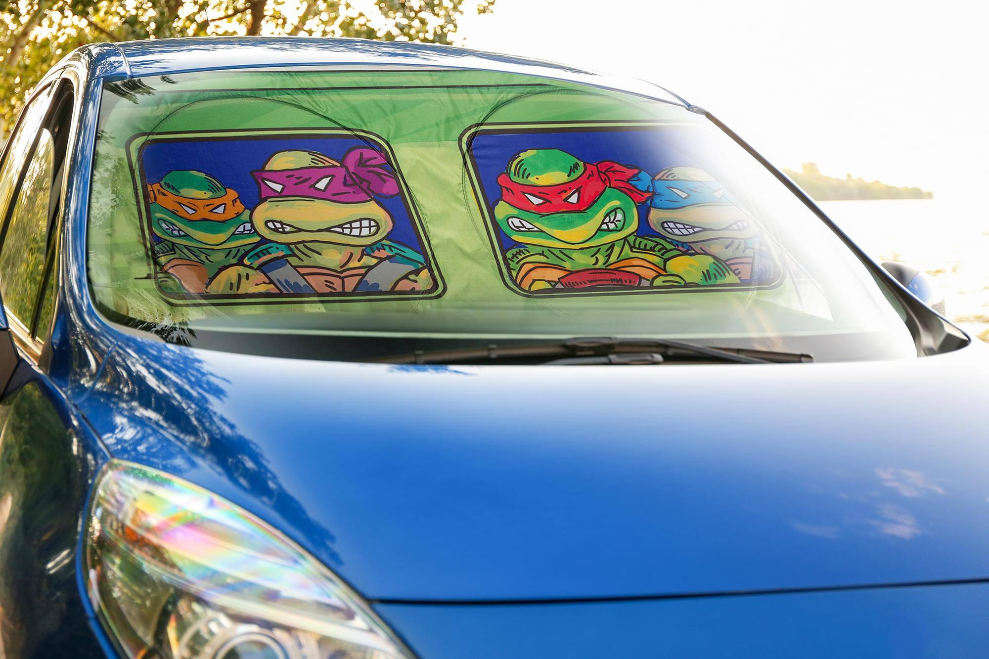 Alt View 4. Surreal Entertainment - Teenage Mutant Ninja Turtles Sunshade for Car Windshield | 64 x 32 Inches - Green.