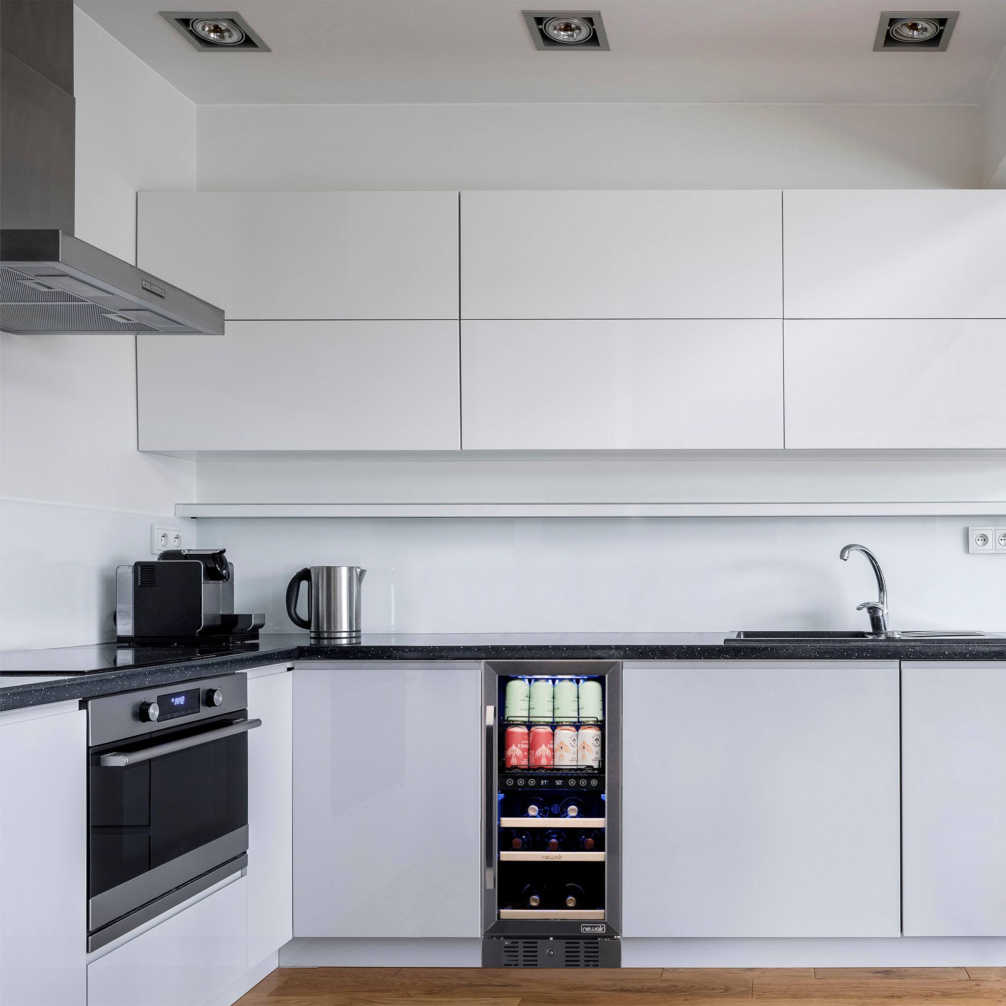 Angle. NewAir - 13-Bottle and 48-Can Built-in Dual Zone Beverage Cooler with SplitShelf - Black Stainless Steel.