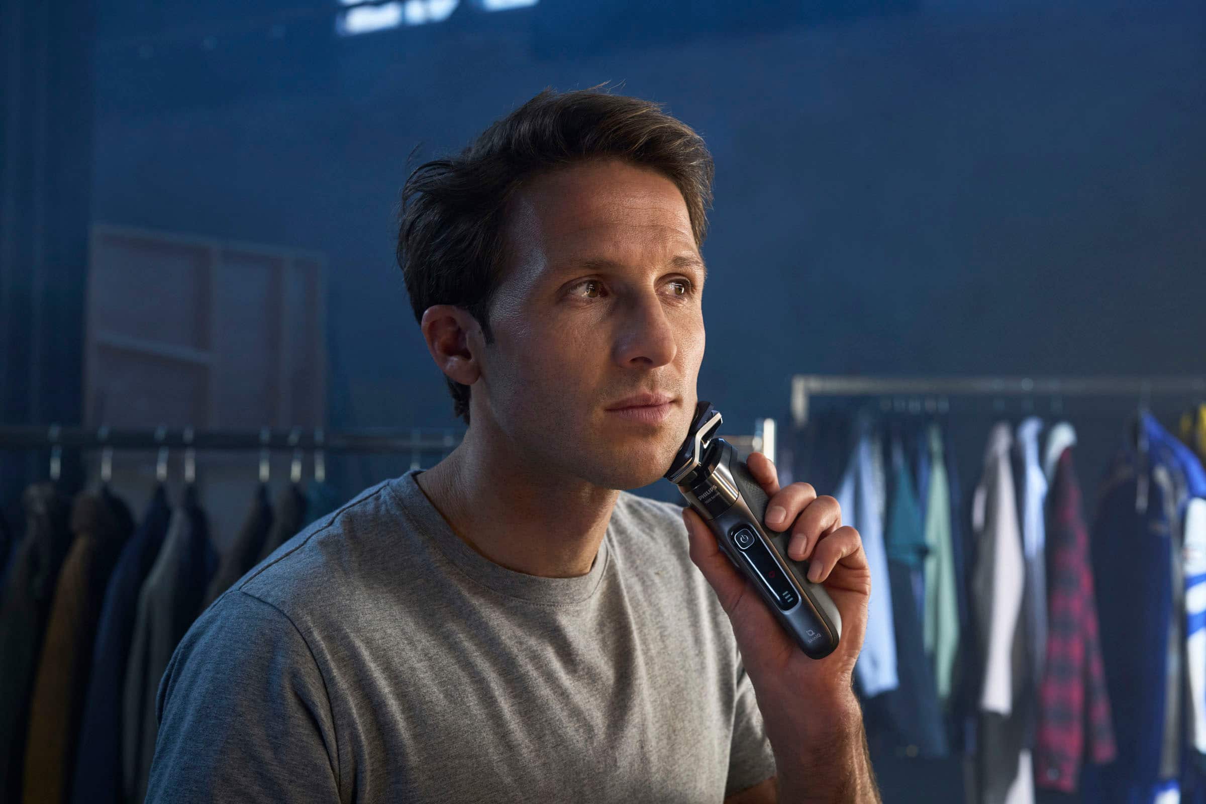 Left. Philips Norelco - Shaver 7200, Rechargeable Wet & Dry Electric Shaver with SenseIQ Technology and Pop-up Trimmer - Black.