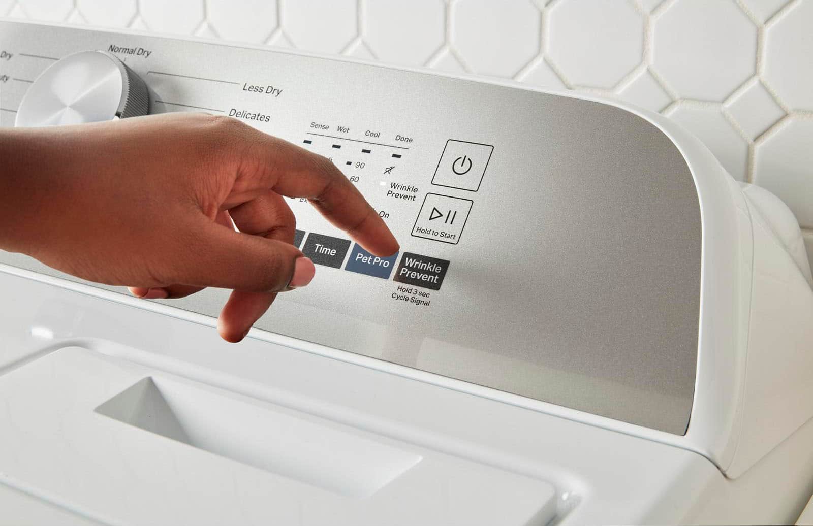 Maytag is the brand of the washing machine in the image.