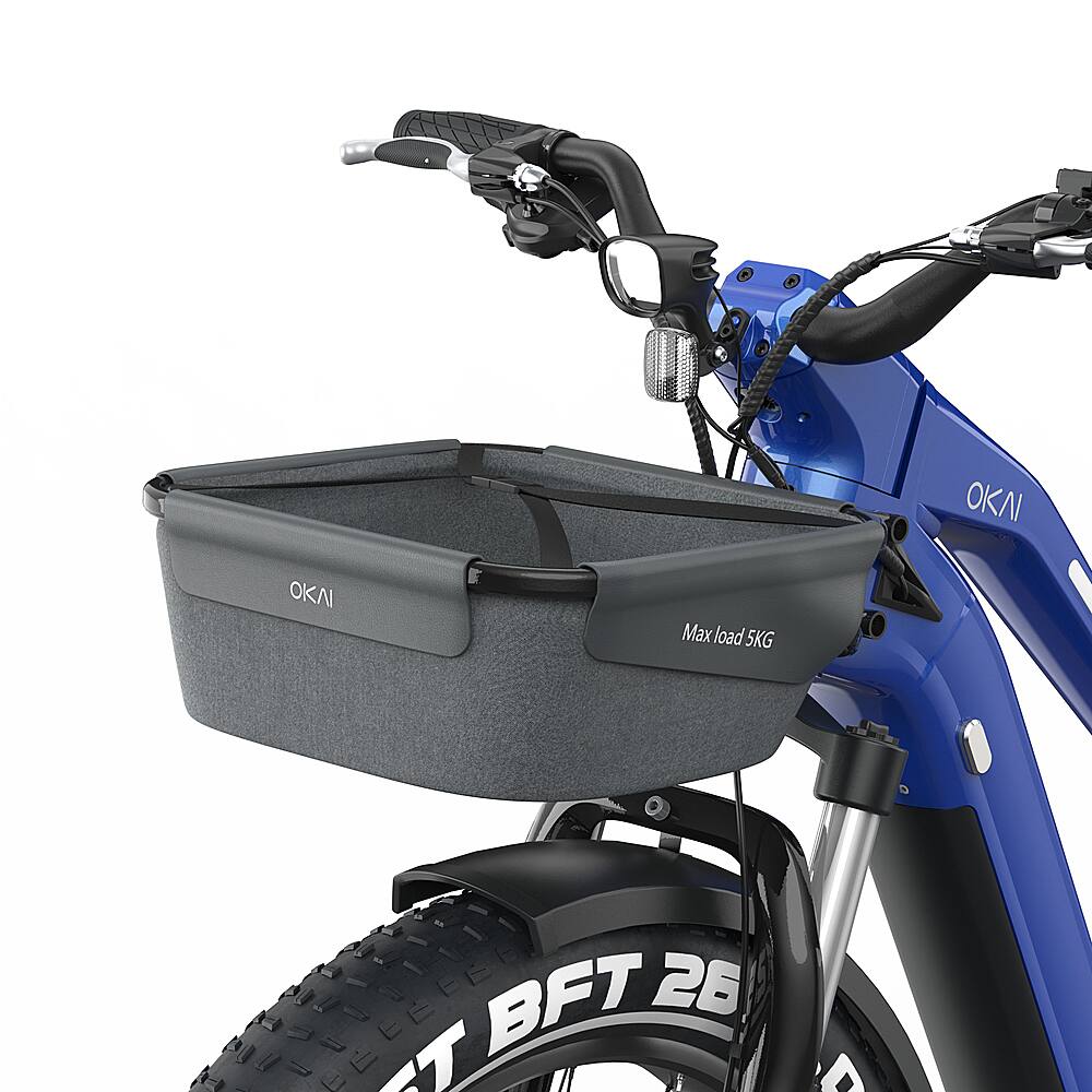 The image features a blue bicycle with a basket attached to the front. The basket is designed to hold up to 5 kg of weight and is made by OKNI. The bicycle is equipped with a basket that can carry a significant amount of weight, making it suitable for various purposes such as grocery shopping or transporting small items.
