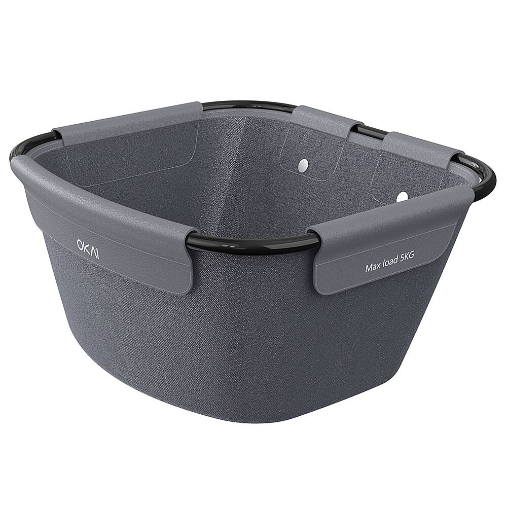 The image features a large gray basket with a black handle, which is designed to hold up to 5 kg of weight. The basket is made by OKI and is suitable for various purposes, such as carrying items while cycling or for use in other outdoor activities. The basket's size and capacity make it a practical choice for transporting goods or personal belongings.