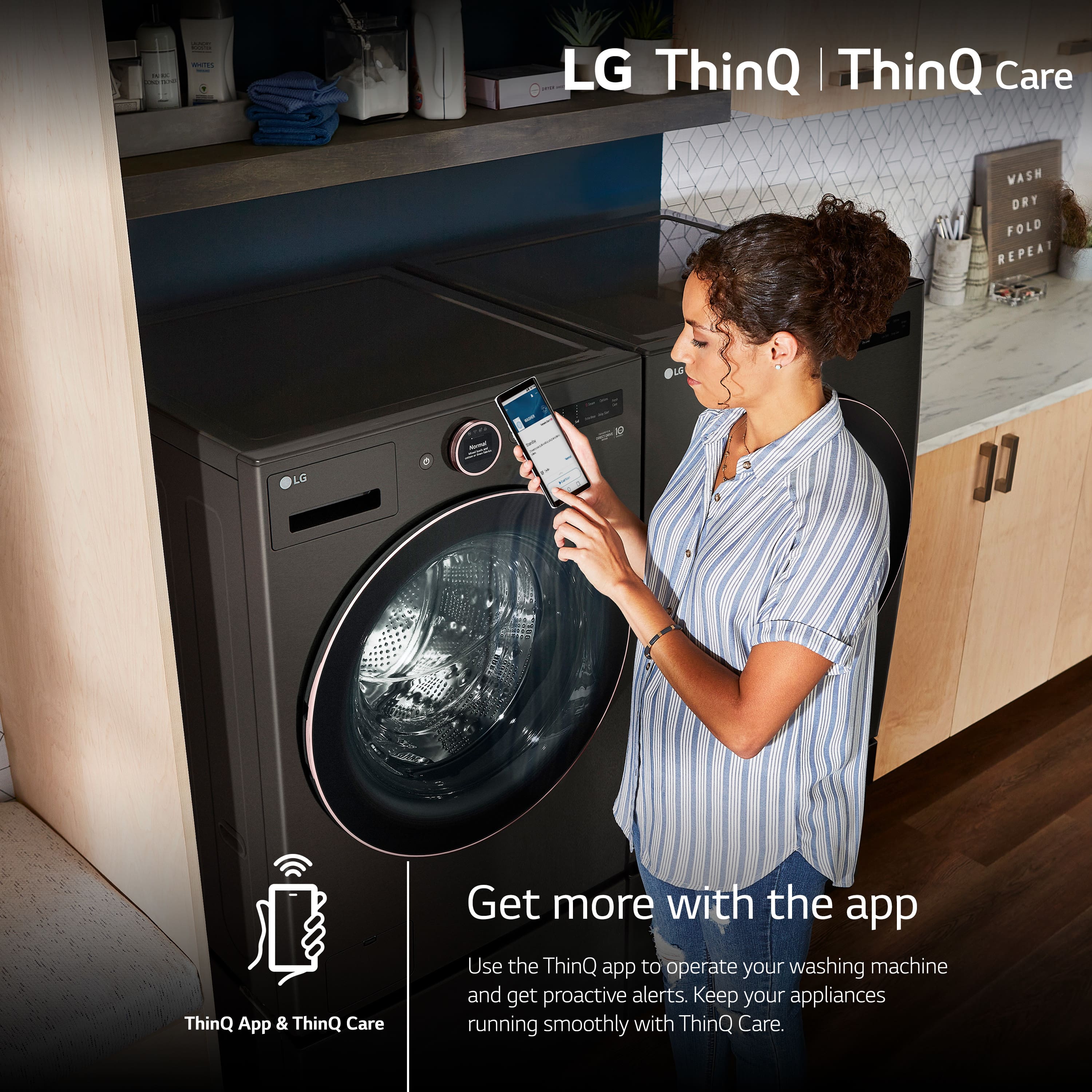 The image features a woman standing in front of a washing machine, looking at her cell phone. The scene is likely related to the LG ThinQ app and ThinQ Care, which provide additional features and benefits for users of LG washing machines. The app allows users to operate their washing machine remotely and receive proactive alerts, while ThinQ Care offers additional warranty and support services. The woman is likely using the app to manage her washing machine or receive information about its operation.