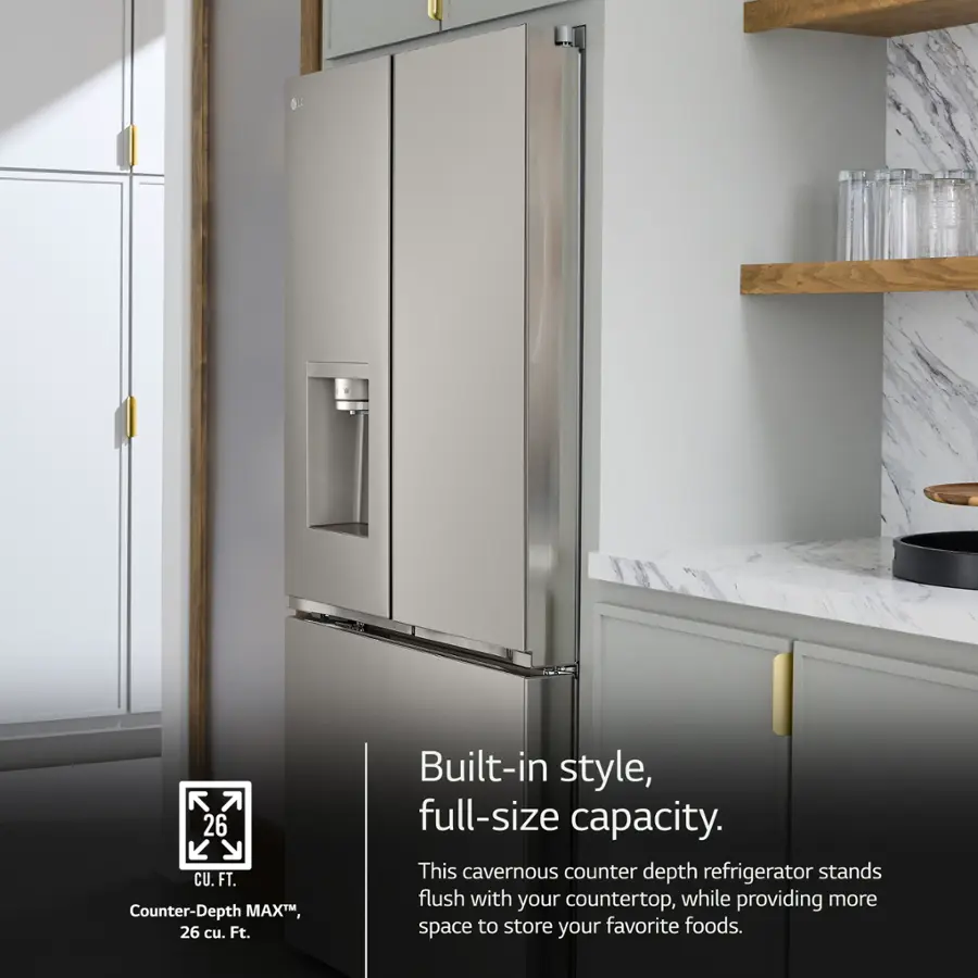 The image features a large, built-in style refrigerator with a full-size capacity. It stands flush with the countertop, offering ample space to store your favorite foods. The refrigerator has a counter-depth design, which maximizes the available space in your kitchen.