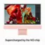 The image features a large computer monitor with a vibrant display of flowers. The monitor is described as being supercharged by the M3 chip, which suggests that it is a powerful and high-performance device. The flowers on the screen are colorful and eye-catching, adding to the overall visual appeal of the computer monitor.