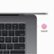 The image features a laptop computer with a Touch ID button on the keyboard. The Touch ID button is located on the right side of the keyboard, and it is a small square button. The keyboard also has various other buttons, including F10, F11, and F12, as well as a delete button.