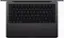The image features a laptop computer with a black keyboard. The keyboard has white letters and numbers on it, making it easy to read and use. The laptop is positioned in a way that the keyboard is clearly visible, showcasing its design and layout.