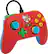 The image features a red and blue controller with a Super Mario sticker on it. The controller has a green button and a yellow button, along with the standard red, blue, and yellow buttons. The controller is connected to a Wii console, and it is ready for use.