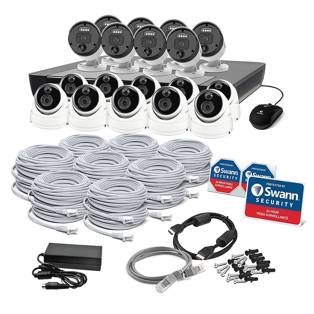 The image displays a video surveillance system, which includes a camera, a microphone, and a weatherproof casing. The camera has a wide-angle view and features a color video image sensor, a true detect PIR heat and motion sensor, and a microphone. The system is designed for easy mounting on a flat surface and has various ports, such as VGA, USB, and HDMI, for connecting to different devices. The weatherproof casing ensures that the system is protected from the elements, and the clear night vision allows for visibility up to 130 feet.