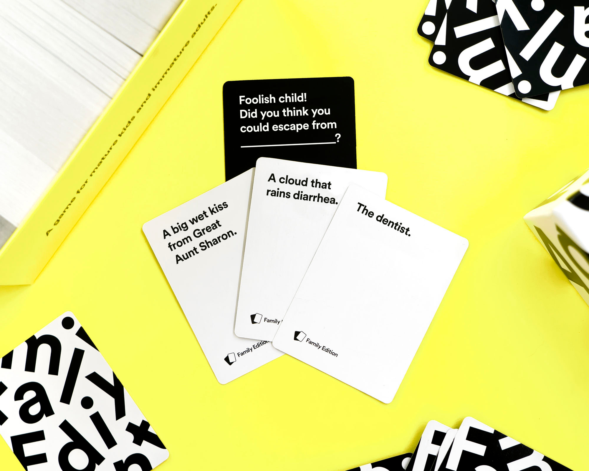 Left View: Cards Against Humanity - Cards Against Humanity: Family Edition Main Game - Black/White