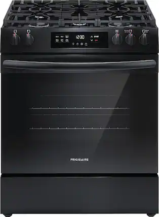 Front. Frigidaire - 5.1 Cu. Ft Freestanding Gas Range with Quick Boil - Black.