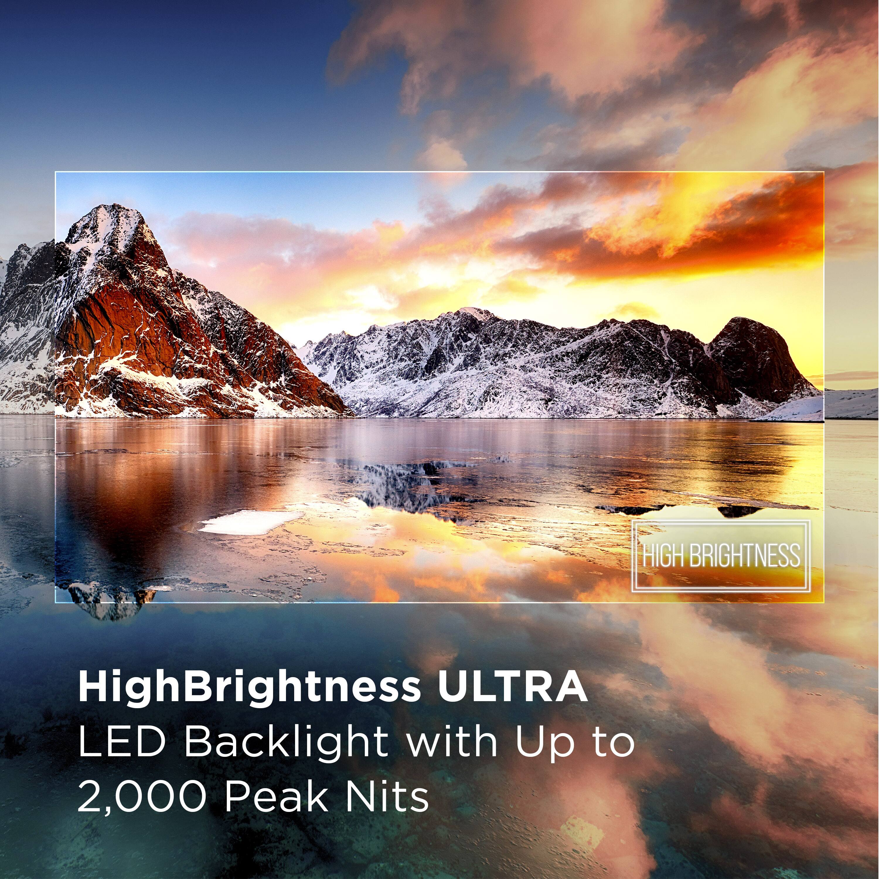 The image features a stunning view of mountains and a lake, with a sunset in the background. The scene is captured in a High Brightness Ultra LED Backlight with up to 2,000 Peak Nits, which enhances the visual experience and brings out the vibrant colors of the landscape. The image is likely being displayed on a High Brightness Ultra LED Backlight TV, which is designed to provide an immersive and high-quality viewing experience.