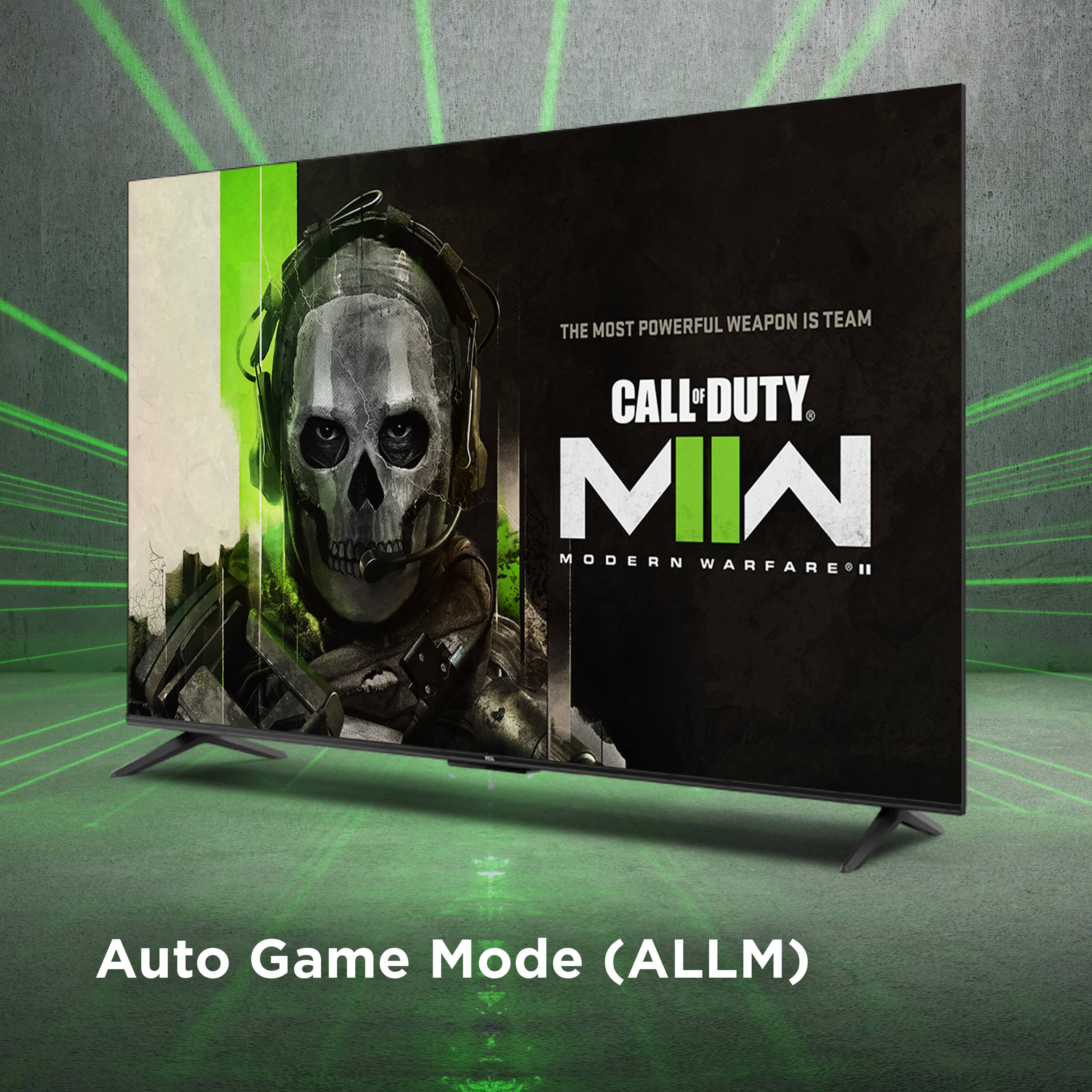 The image features a large flat screen TV with a Call of Duty advertisement displayed on it. The advertisement showcases a skeleton wearing a gas mask, emphasizing the powerful weapon in the game. The TV is placed on a stand, and the advertisement is promoting the Modern Warfare game. The TV is turned on, and the advertisement is clearly visible, making it an effective marketing tool for the game.