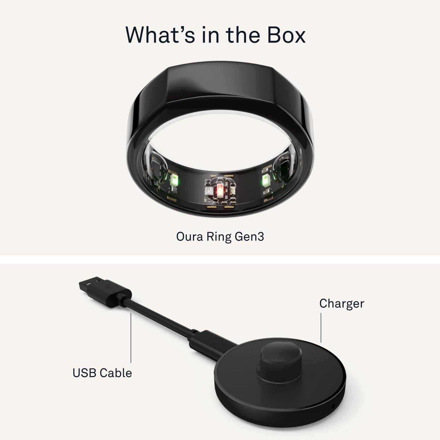 The image features a ring and a USB cable, both of which are part of the Oura Ring Gen3. The ring is a wearable device that helps monitor sleep, activity, and heart rate, while the USB cable is used for charging the ring. The ring is placed on top of the USB cable, indicating that it is being charged. The image also includes a close-up of the ring, showcasing its design and features.