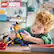 The image features a young boy playing with a Lego Marvel figure, which is a part of the Lego Marvel 8+ 327 set. The boy is holding the figure and appears to be enjoying his time with the toy. The Lego Marvel set is designed for children aged 8 and above and contains 327 pieces.