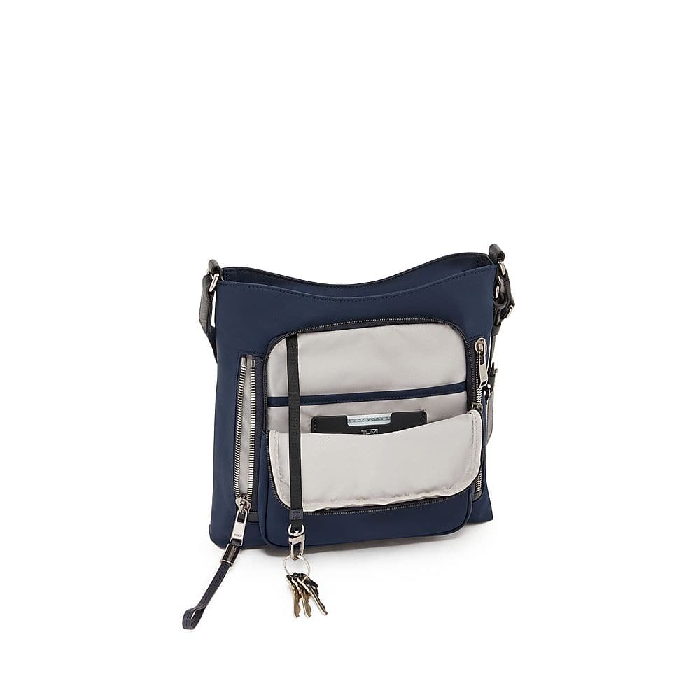 Left. TUMI - Voyageur Tyler Crossbody - Indigo.