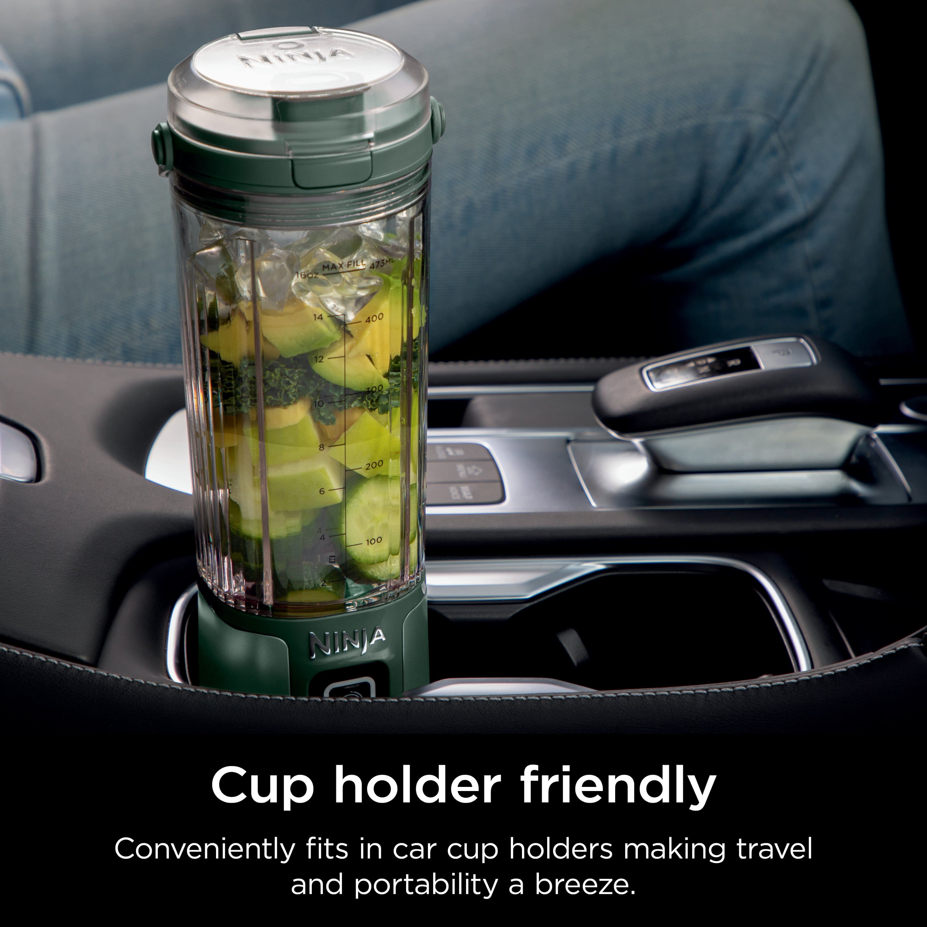 The image features a Ninja blender sitting in a car cup holder, making it a convenient and portable option for travel. The cup holder is designed to fit comfortably in the car, providing a convenient and portable solution for blending and enjoying smoothies on the go.