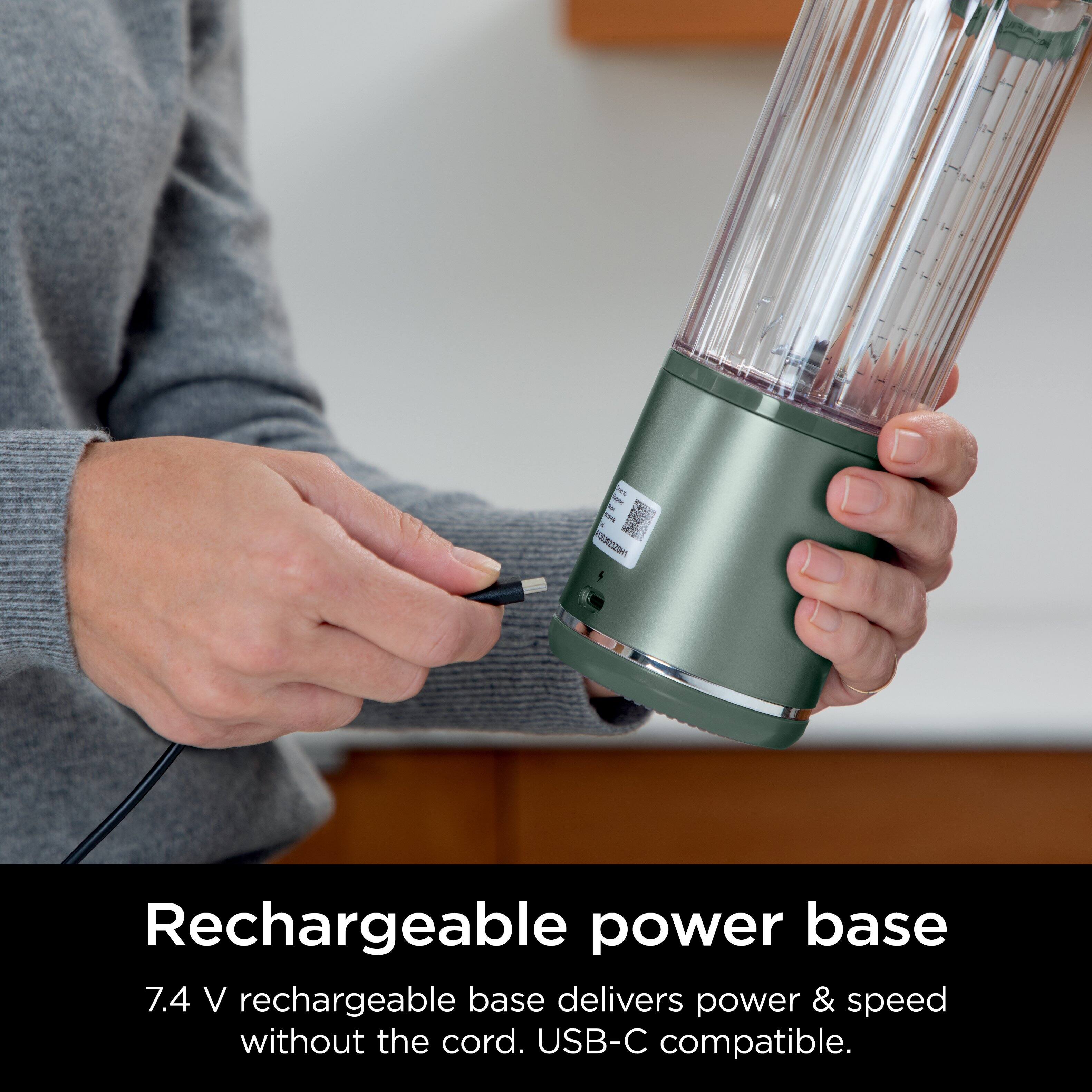 The image features a person holding a green rechargeable power base, which is a portable and convenient device that delivers power and speed without the need for a cord. The power base is compatible with USB-C, making it a versatile and efficient option for charging and powering various devices.