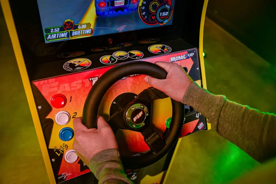 The text on the image reads:

0000000 I 4 3 2 I 4  N20 152 MPH 0.00 2.52 DRIFTTIME AIRTIME 230 Fast & Furious Arcade Game.