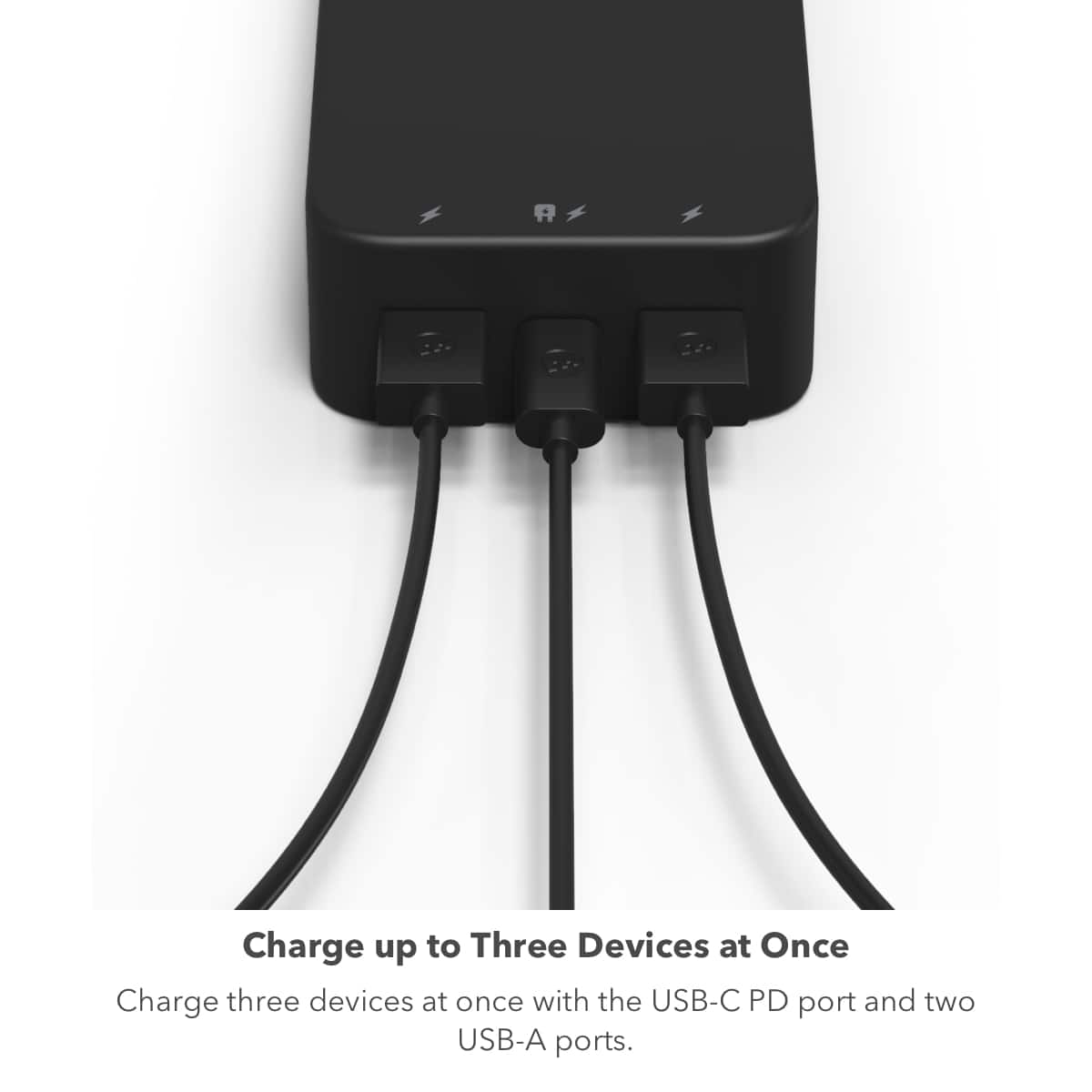 The image features a portable power pack that can charge up to three devices at once. It has a USB-C PD port and two USB-A ports, allowing users to charge multiple devices simultaneously. The power pack is black and sits on a white background, making it stand out in the image.