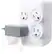 The image features a white power strip with four outlets. The outlets are protected and grounded, ensuring the safety of the devices plugged into them. The power strip is designed to accommodate various devices, making it a versatile and practical accessory for any home or office.
