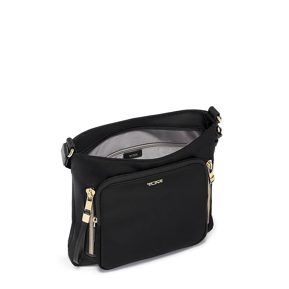 Angle. TUMI - Voyageur Tyler Crossbody - Black/Gold.
