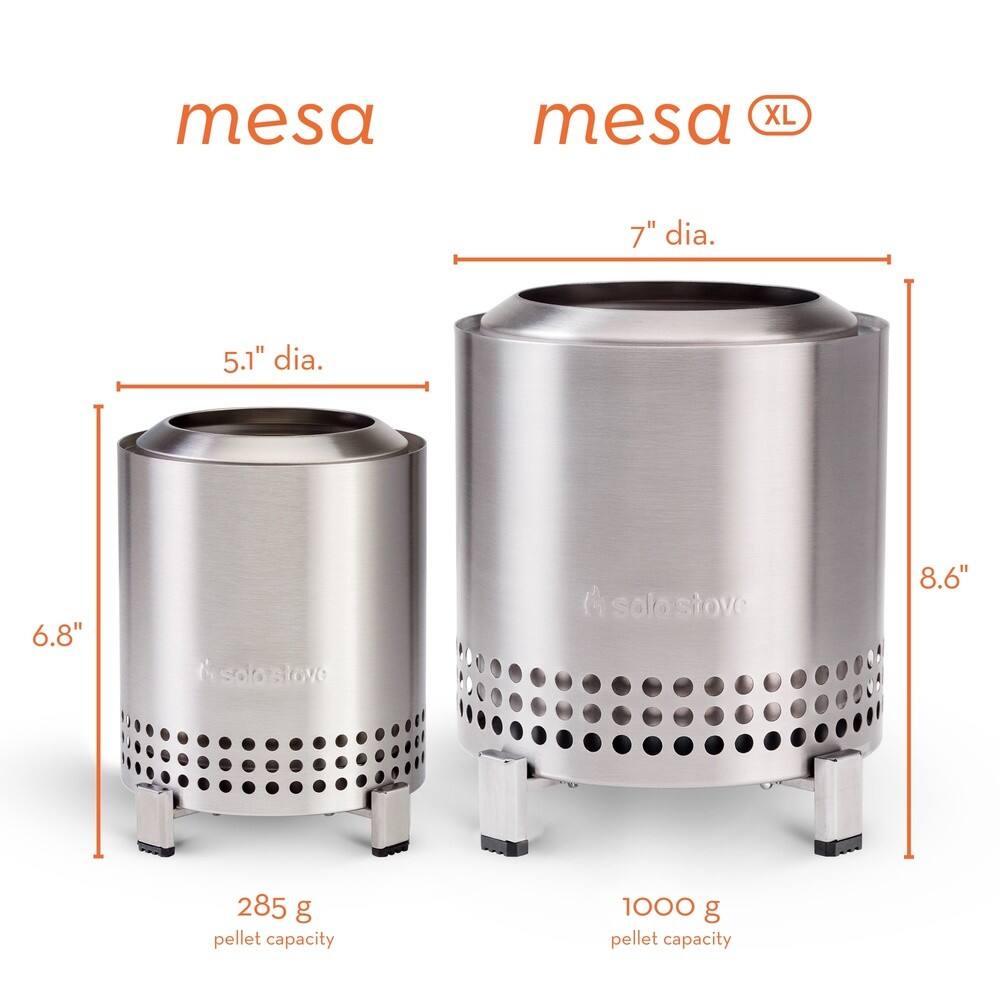 The image features two stainless steel fire pits, one larger and one smaller. The larger fire pit is labeled "mesa XL" and measures 7" in diameter, while the smaller fire pit is labeled "solo stove" and measures 5.1" in diameter. Both fire pits have a 285 g pellet capacity, but the smaller fire pit also has a 1000 g pellet capacity. The image showcases the size difference between the two fire pits and their respective capacities.