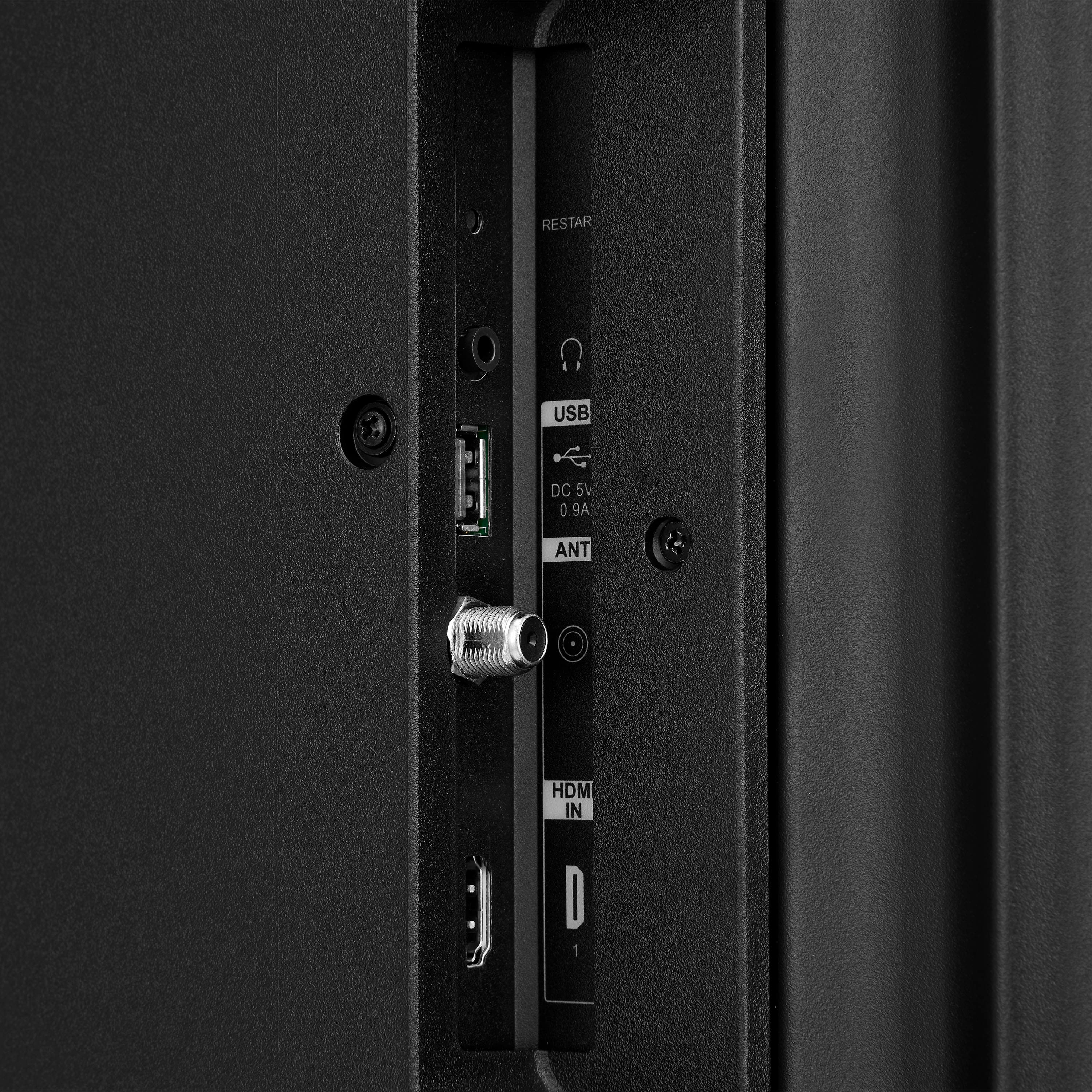 The image shows a close-up of a black box with a USB port on it. The USB port is labeled "USB DC 5V 0.9A ANT HDMI IN D 1." This label indicates that the USB port is designed to provide a stable 5V power supply with a current of 0.9 amps, and it is also compatible with HDMI input. The USB port is likely used for connecting devices such as smartphones, tablets, or other electronic devices to the box for charging or data transfer purposes.