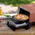 Alt View Zoom 21. Ninja - Woodfire Pizza Oven, 8-in-1 Outdoor Oven, 5 Pizza Settings, 700°F, Smoker, Woodfire Technology, Electric - Terracotta Red.