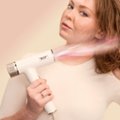 The image features a woman with red hair holding a white hair dryer. The hair dryer is advertised as "No Heat Damage," as it regulates heat 1,000 times per second, never getting hotter than 230F.