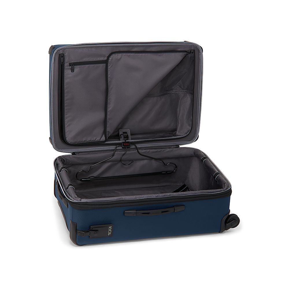 Left View: TUMI - Aerotour Short Trip 28" Expandable 4 Wheeled Spinner Suitcase - Navy