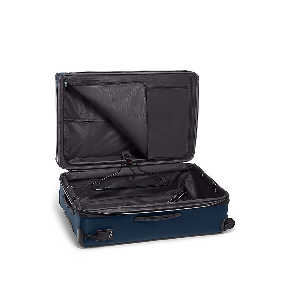 Left View: TUMI - Aerotour Extended 33" Expandable 4 Wheeled Spinner Suitcase - Navy