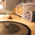 Alt View Zoom 12. iRobot Roomba j9+ Self-Emptying Robot Vacuum - Ruby Bronze.