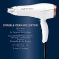 The image features a white hair dryer with a black handle, which is a Conair 1875 Double Ceramic Dryer. This hair dryer has a 1875-watt power, making it a powerful and fast drying option. It utilizes 2x Ceramic Technology for greater heat protection, ensuring that the user's hair remains healthy-looking. The hair dryer also has a conditioning lons feature, which helps to keep the hair soft and smooth. Additionally, the device has 3 heat settings and 2 speeds, providing versatility and customization for the user's preferences.
