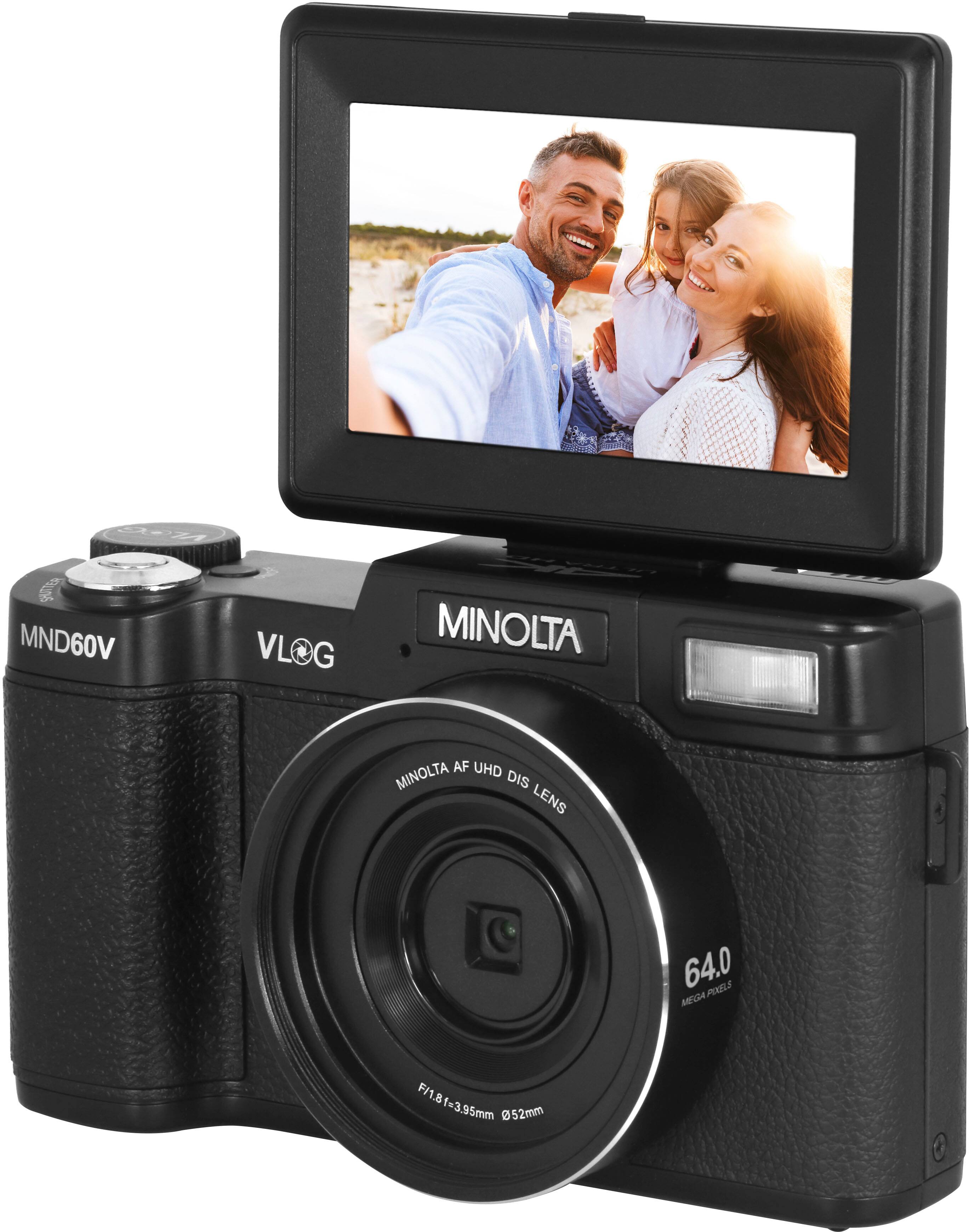 The text on the image reads: "S MND60V VLOG G MINOLTA AF UHD MINOLTA DIS LENS 64.0 POELI MECH F/1.8f=3.95mm @52mm."