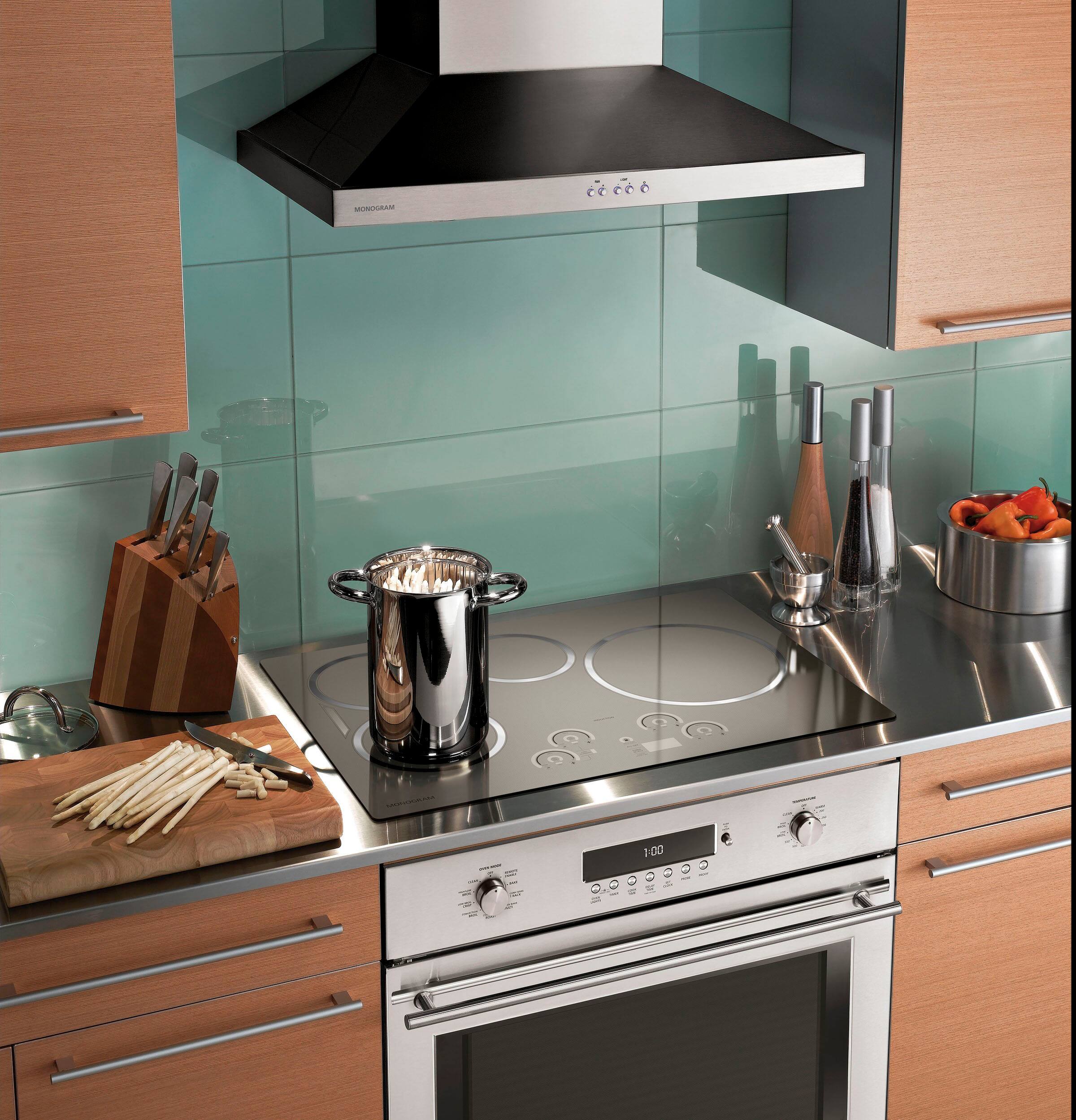 Angle. Monogram - 30" Convertible Range Hood - Stainless Steel.