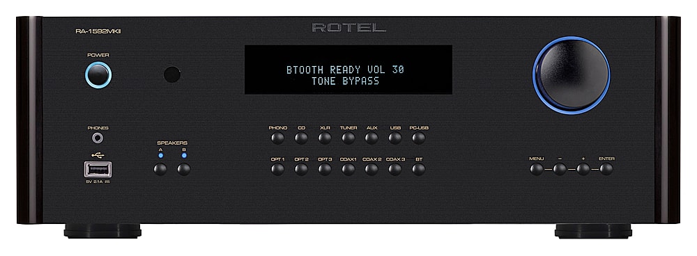 The text on the image reads: "ROTEL POWER AMPLIFIER READY VOL 30 TONE BYPASS PHONES PHONO CD XLF TUNER AUX IN/OUT PC-USB SPEAKERS OPT1 CPT2 OPT COAX1 COAXR COAXS BST MENU ENTER BV DIA -". This text is likely describing the features and capabilities of a Rotel power amplifier.