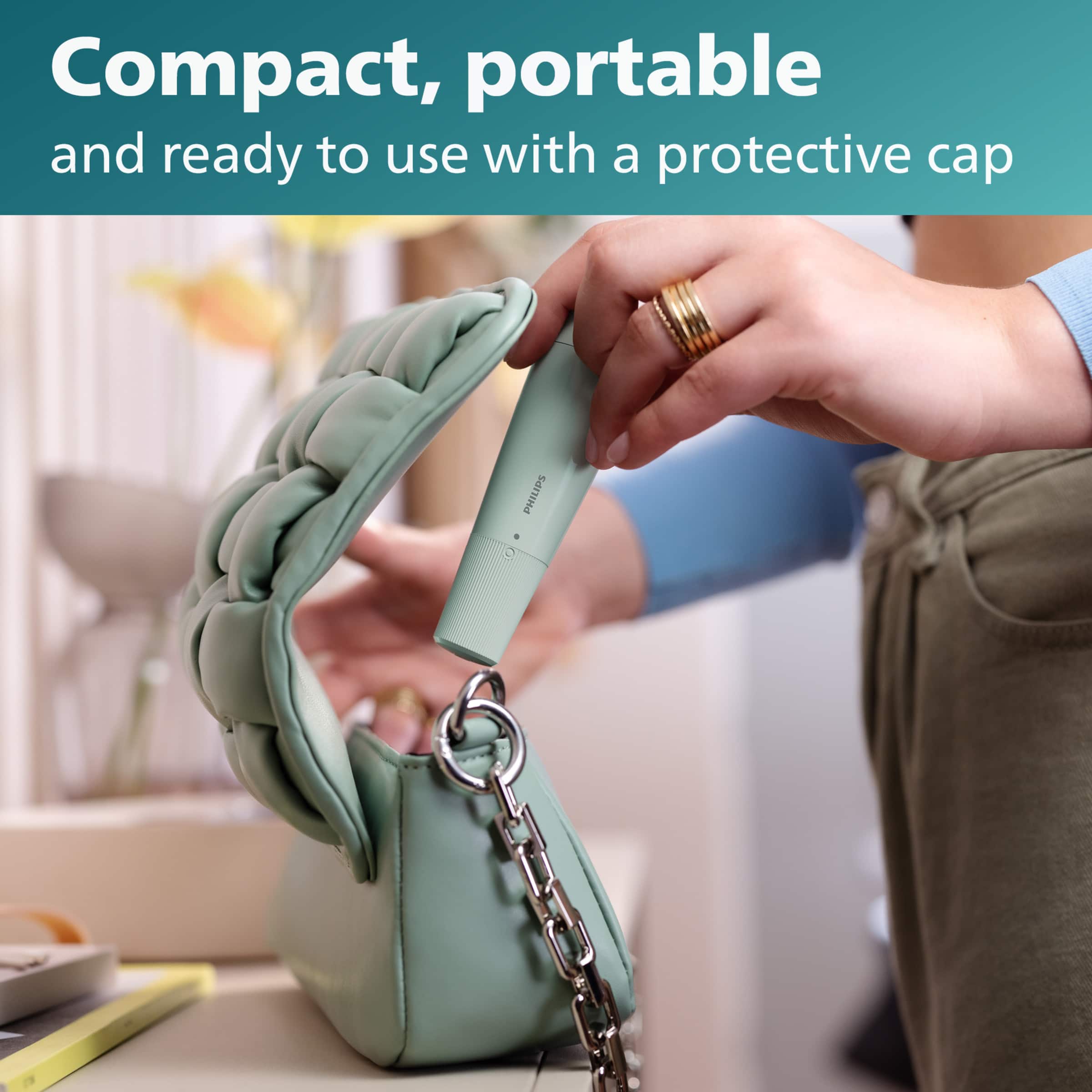The image shows a woman holding a compact, portable hair trimmer with a protective cap. The trimmer is designed for easy use and storage, making it a convenient tool for personal grooming. The woman is likely preparing to use the trimmer for her hair or someone else's.