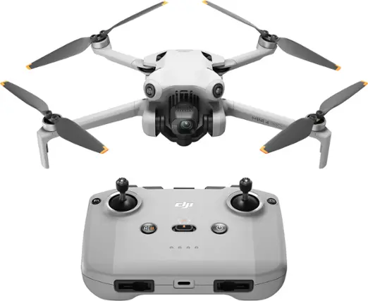 The text on the image reads: "125 ... MINI 4 PRO Fn  (5) H CNS N4 .I. ...D". However, this text does not seem to be related to the image of the drone and remote control. The image shows a white drone with four propellers and a remote control, which is likely used for flying the drone.