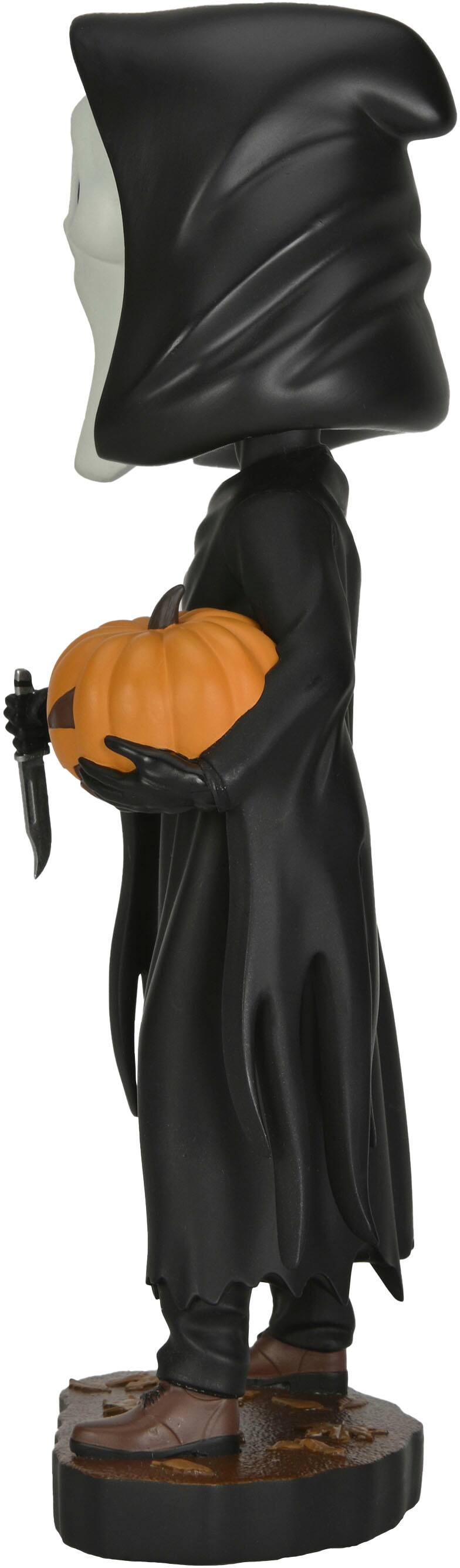 Left. NECA - Ghost Face with Pumpkin Head Knocker.