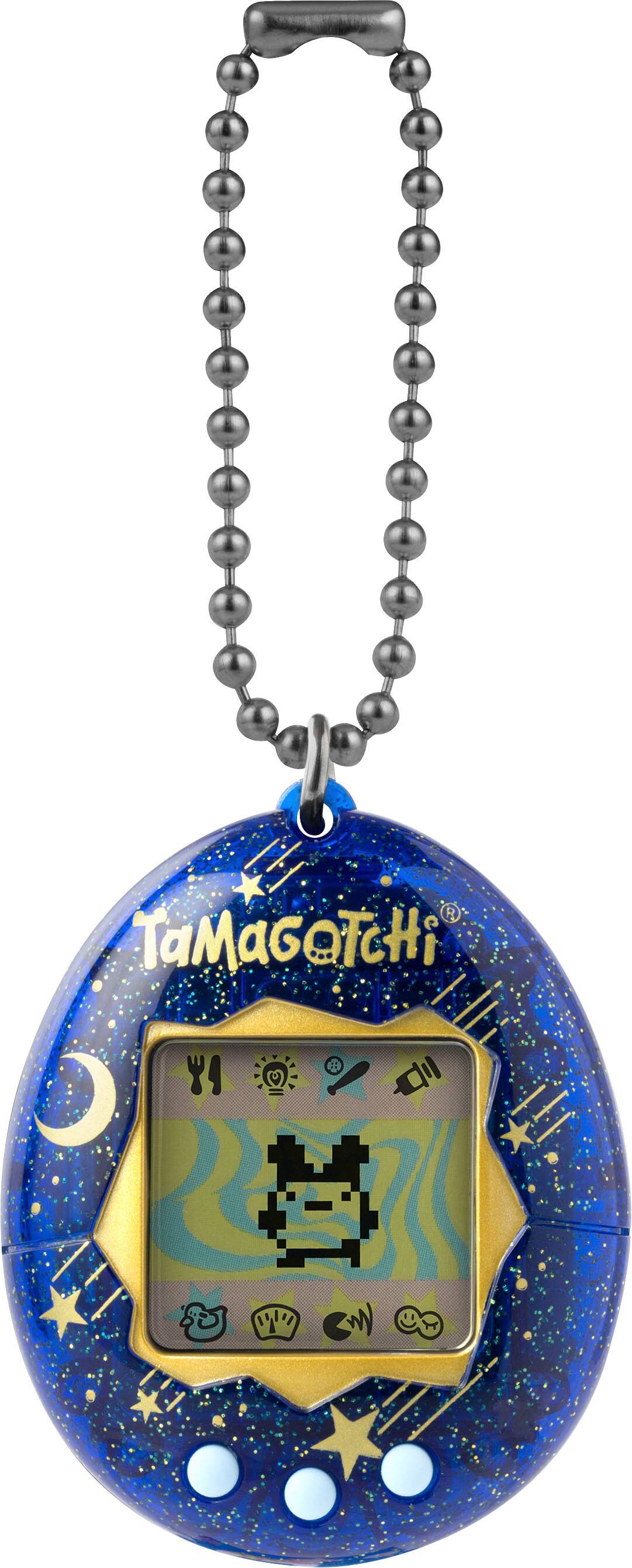 Left. Bandai - Original Tamagotchi - Starry Shower.