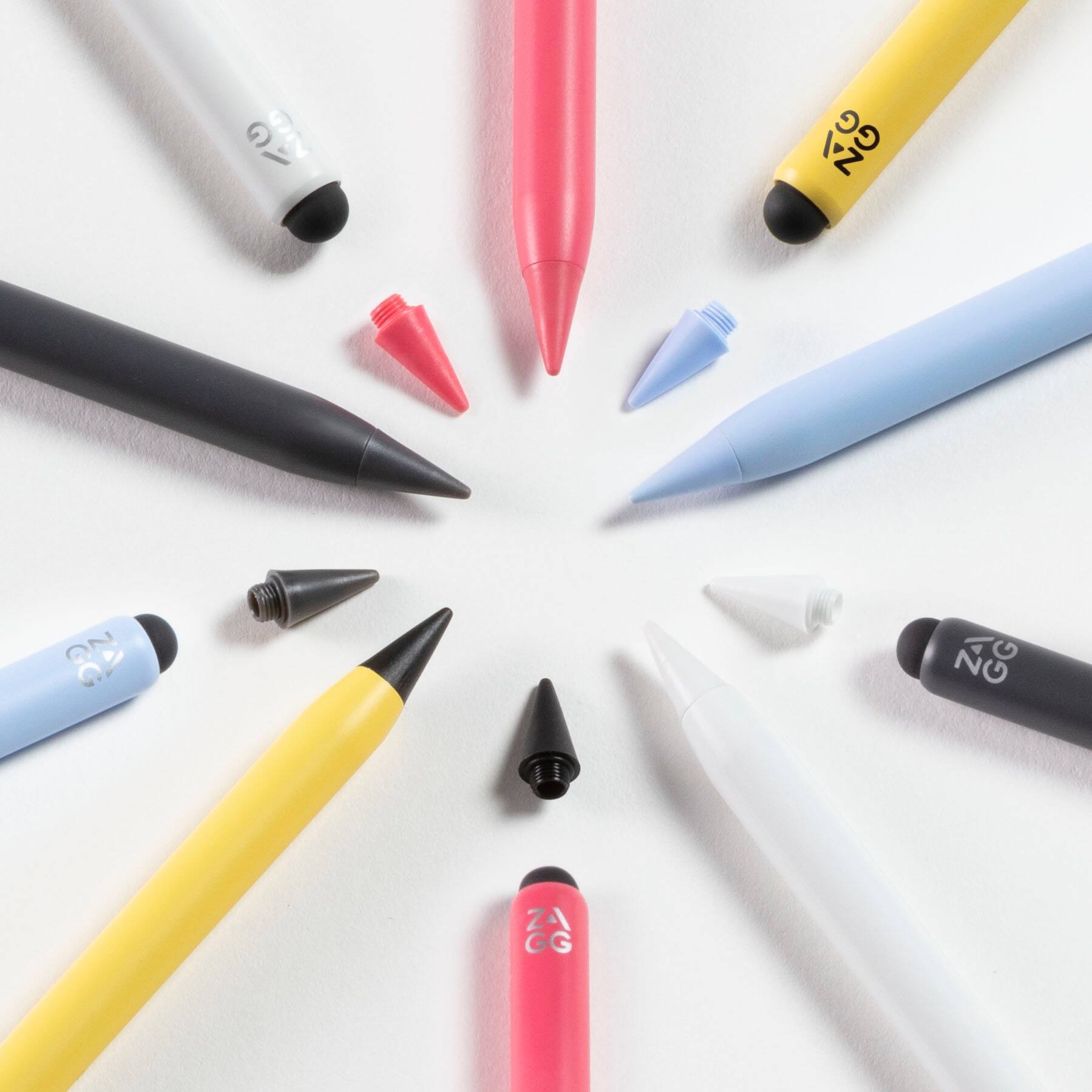 The image features a collection of various colored pens and pencils, including a Dual Tip Stylus. The Dual Tip Stylus is designed to scroll with the universal capacitive backend tip, allowing users to write or draw with the active tip that comes with tilt recognition. Additionally, the stylus comes with a spare tip for added convenience.