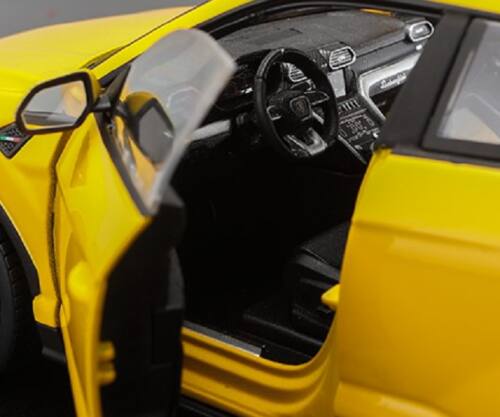 Left. Bburago - Lamborghini Urus Yellow 1/18 Diecast Model Car by Bburago - Yellow.