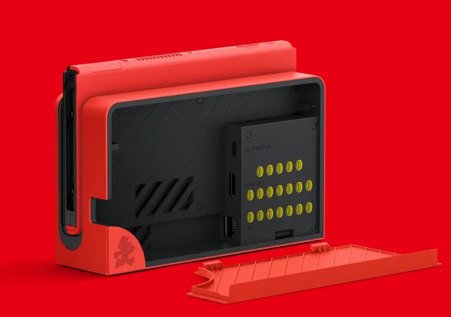 The text on the image reads "OEIEA AC ADAPTER 00.00 [0 I D 0 HDMI OUT [D I I 0 I D 0 0 I 0...00 0 I 0 I LAN." This text is likely a description or a label for the electronic device.